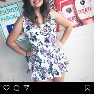 Floral romper tight fitted around stomach area